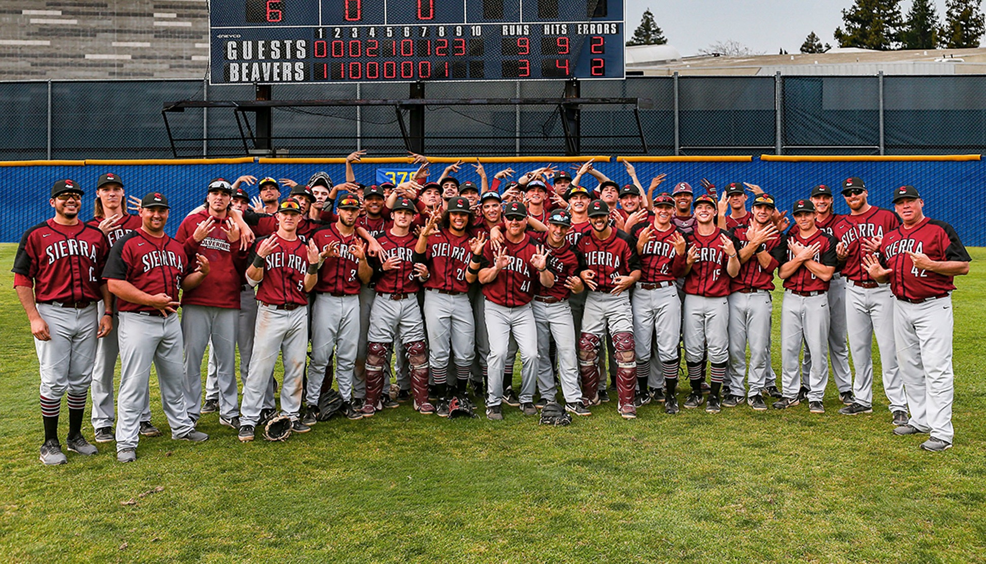 Sierra College Baseball team poses with Head Coach Rob Willson after he secured his 600th career win with a 9-3 victory at American River College on March 19, 2019. (Photo by Dave Lawicka)