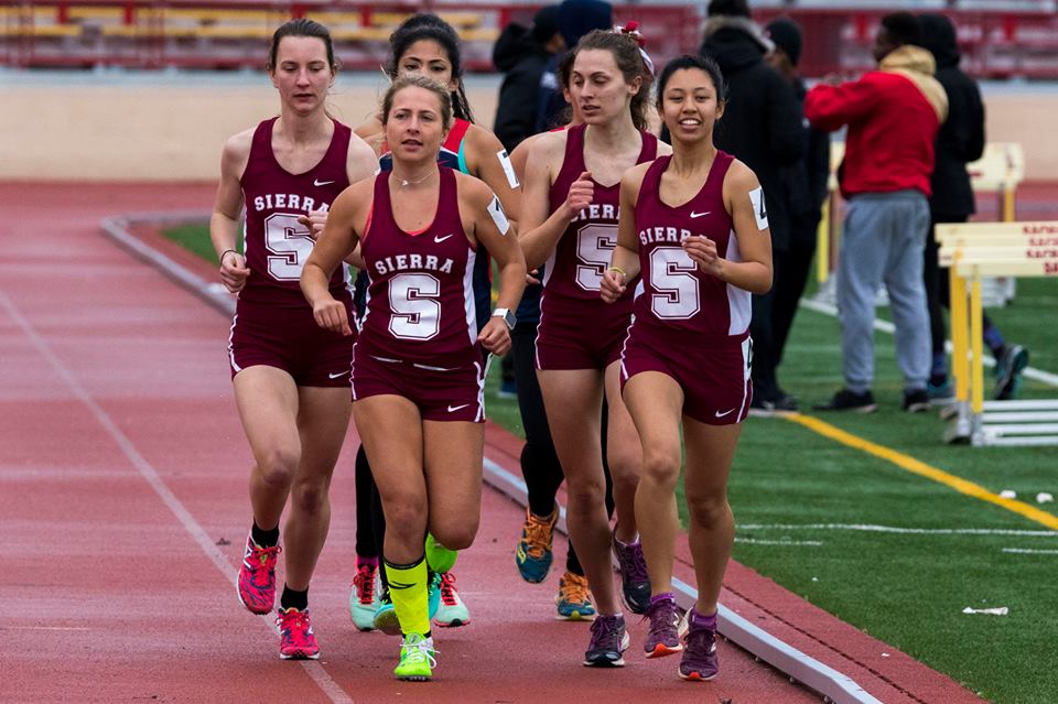 (L-R) Lucie Chevreuil, Annie Ware, Emily Negus and Jasmine Napenas run in the 3000m at Sacramento City College. (Photo by David Sanborn/Sierra College)